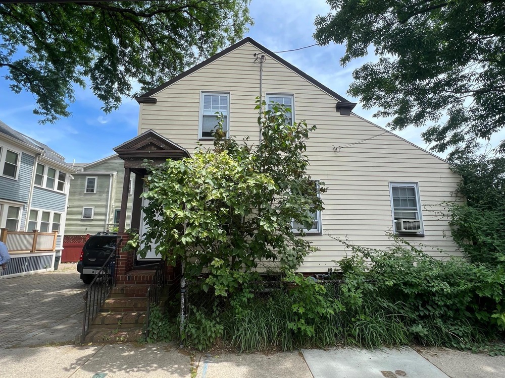 A house at 6 Union Street before being renovated through the Home Improvement Program.