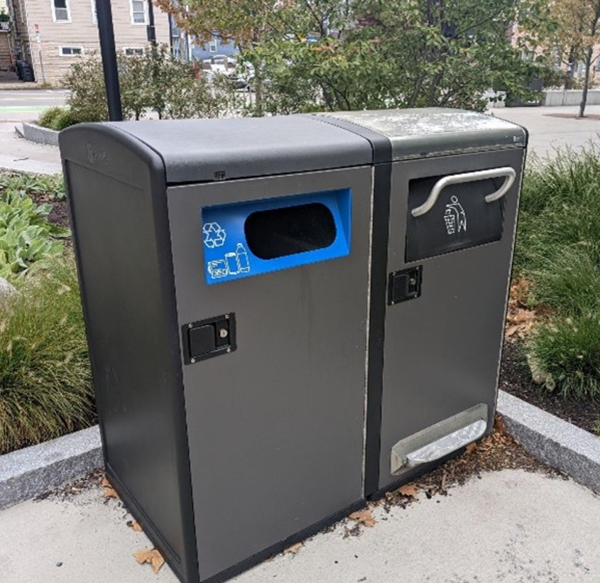 BigBelly trash and recycling compactors in a Cambridge park.