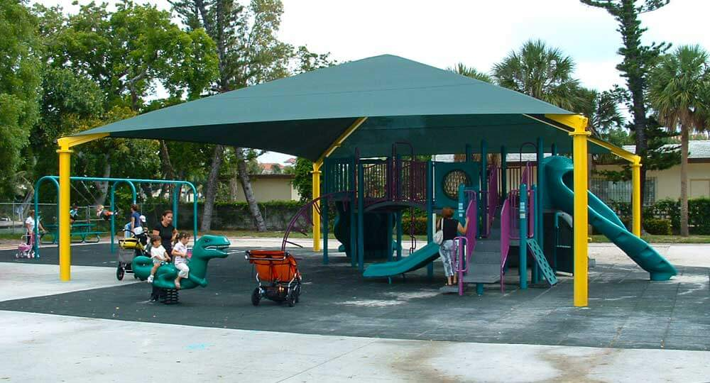 Outdoor playground covered by a permanent canopy