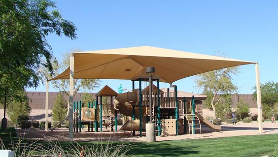 Outdoor playground covered by a permanent canopy