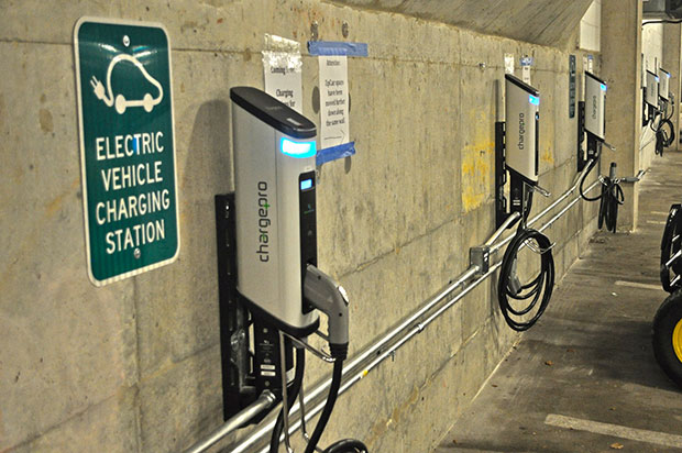 Row of EV charging stations in a garage