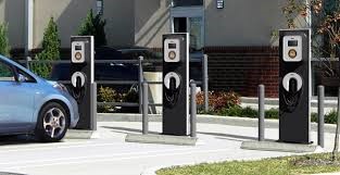 Row of EV charging stations in a parking lot