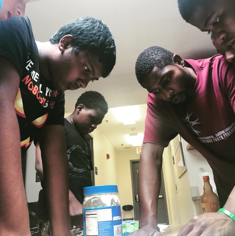 Teens working on a project at the Gately Youth Center